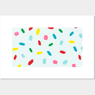 Colorful sprinkles on blue melting icing Posters and Art